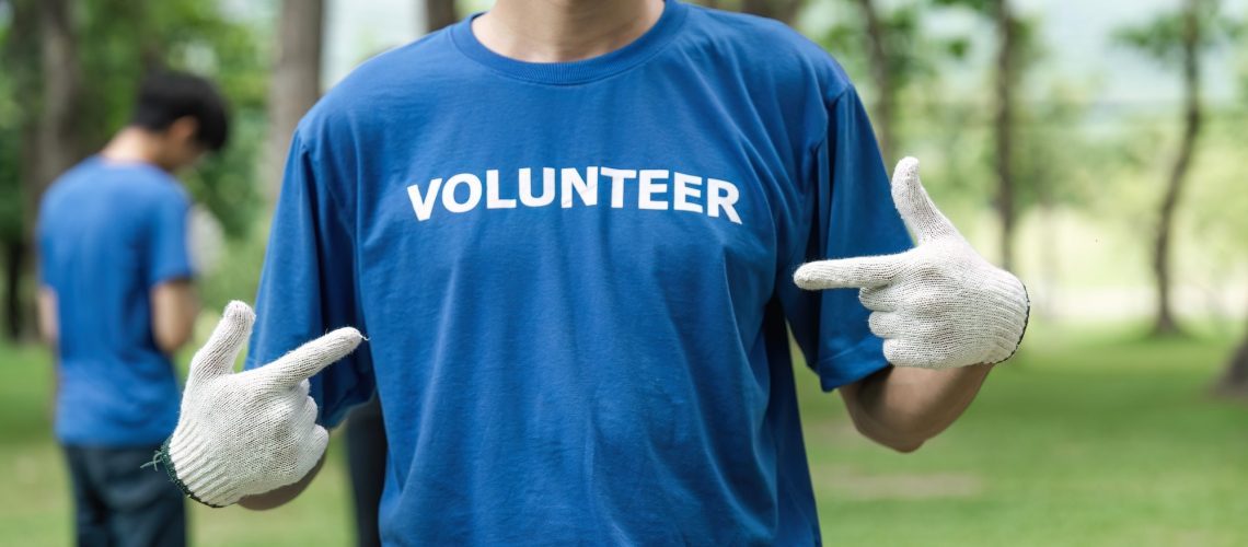 Close Up Young Man Volunteering Wearing T Shirt With Volunteer Message Qfskga48r9gyd5avo4av25wzaj4ewmvlikgdtvmrns